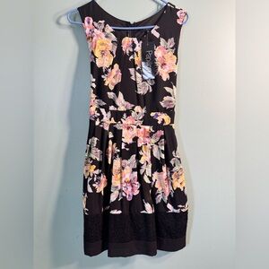 NWTs sleeveless dress, tie belt, size medium. Bought at a boutique.